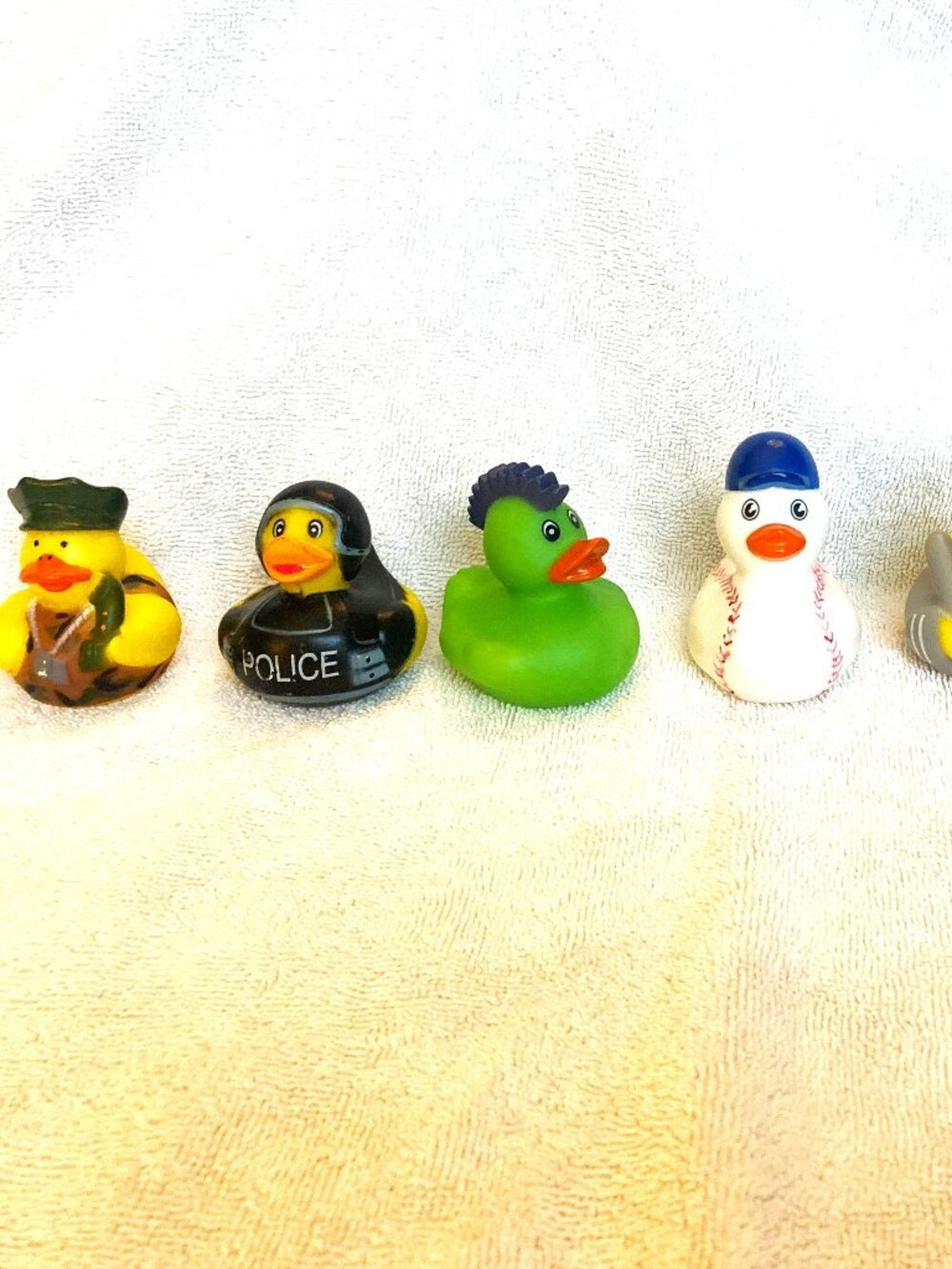 7 Plastic Ducks, Baseball, Football, Soccer, Policeman and Army Duck